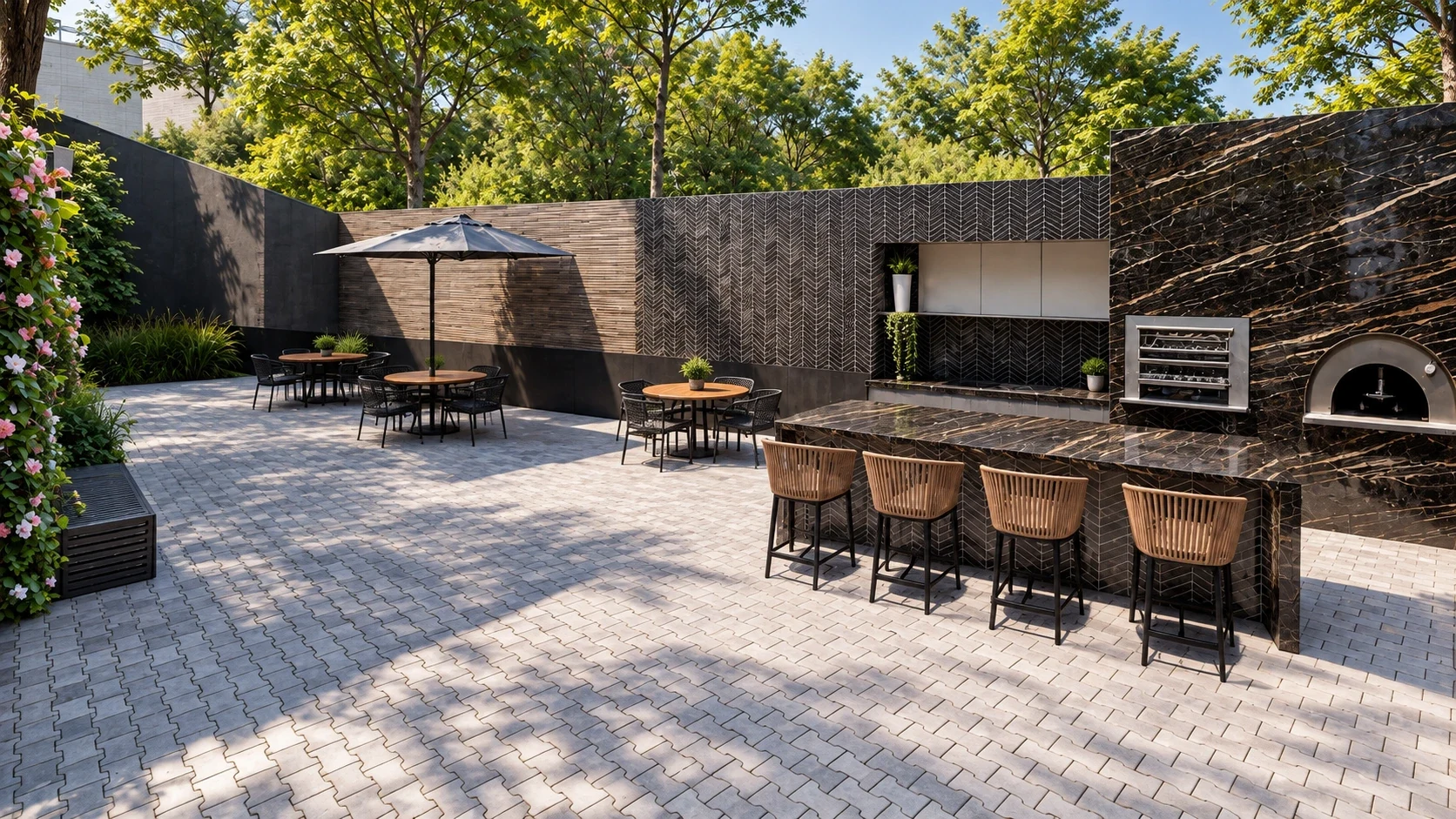 Outdoor gourmet summer kitchen with honed quartz counter and outdoor grill.