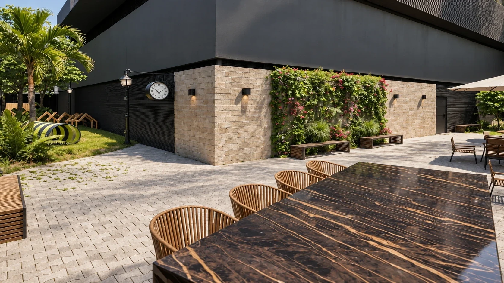 Social terrace under custom architectural canopies surrounded by desert landscaping.